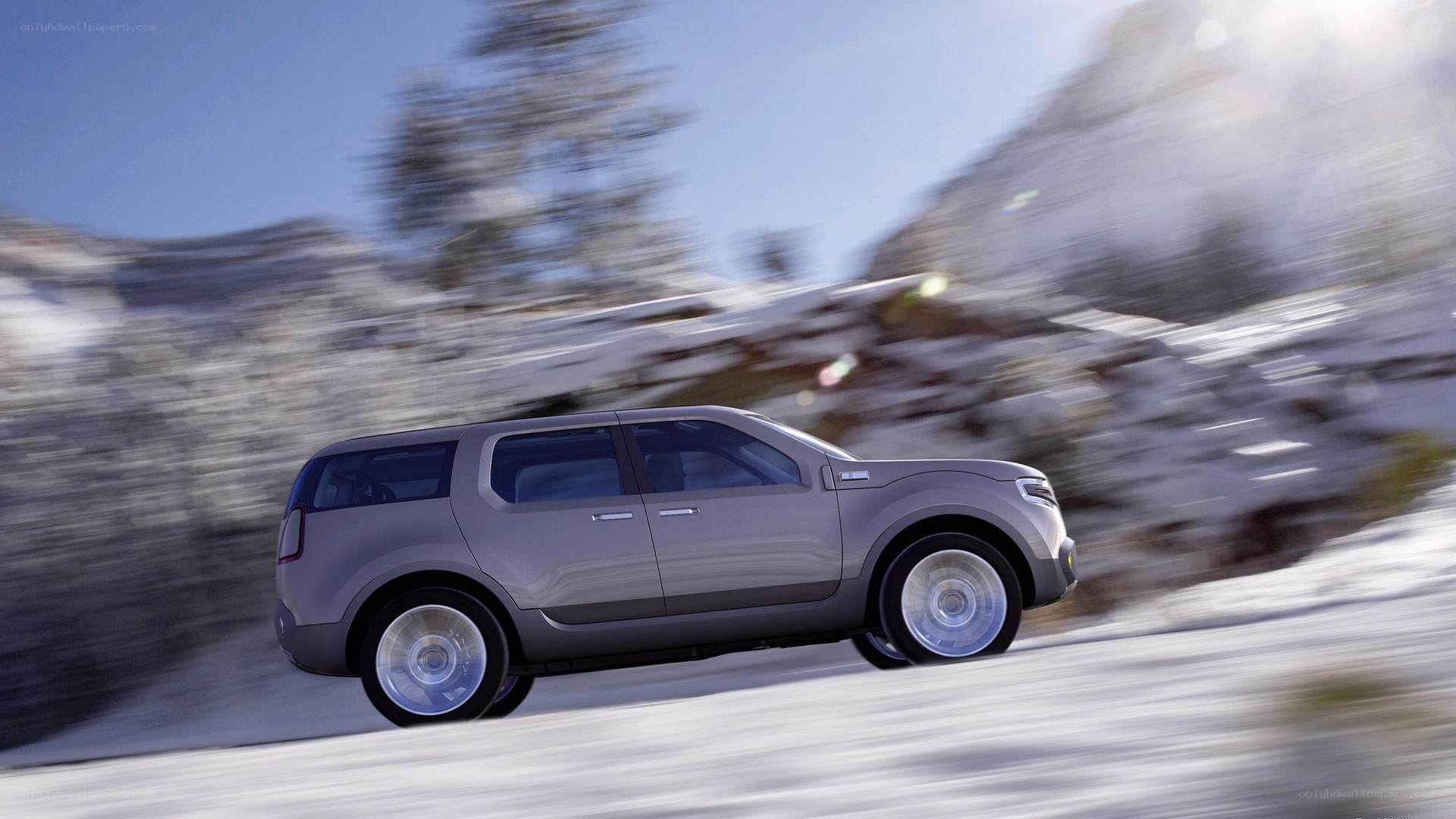 SUV driving on snowy road