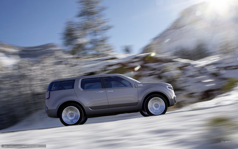 SUV driving on snowy road