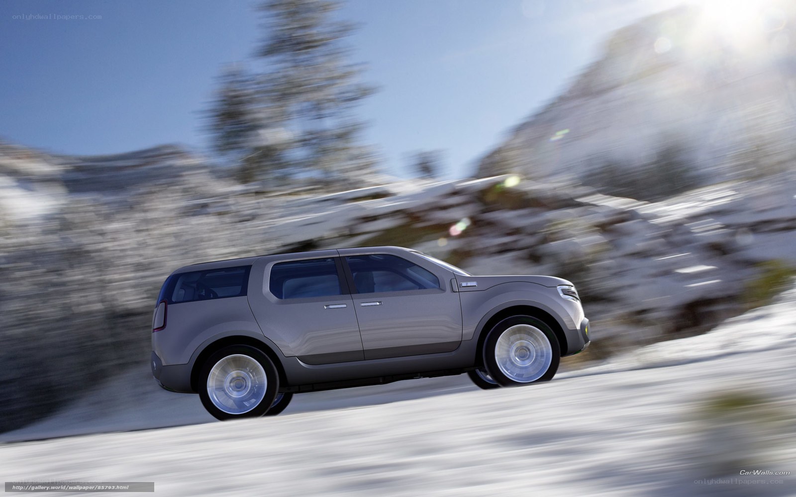 SUV driving on snowy road