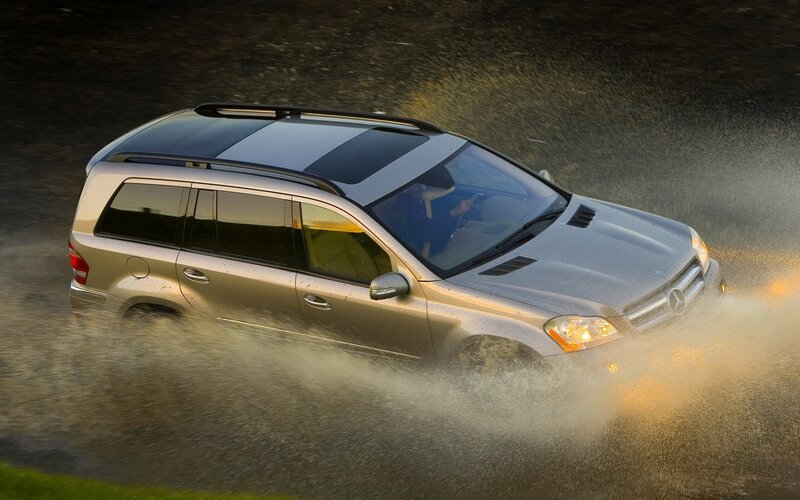 SUV driving through water