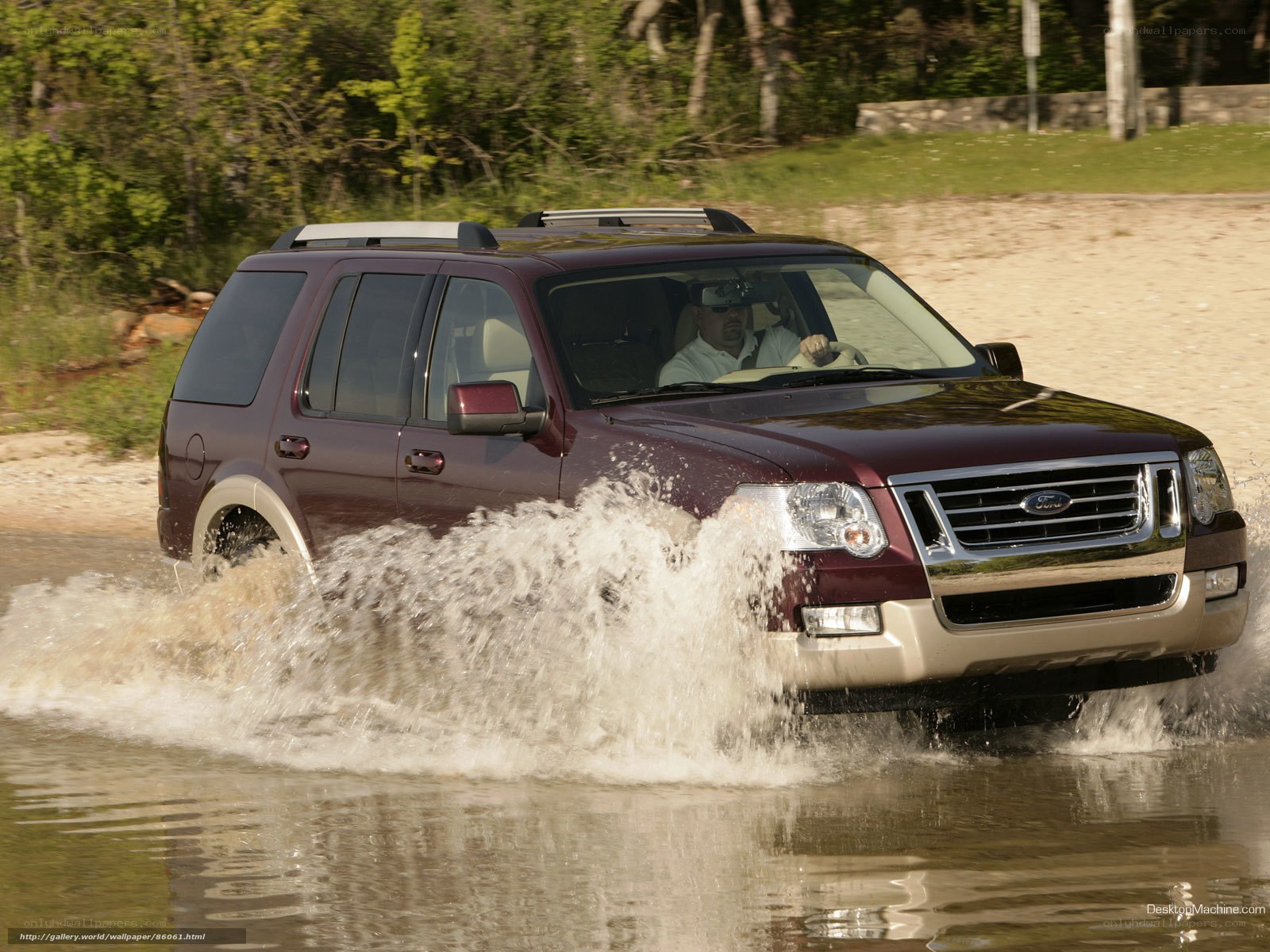 SUV driving through water
