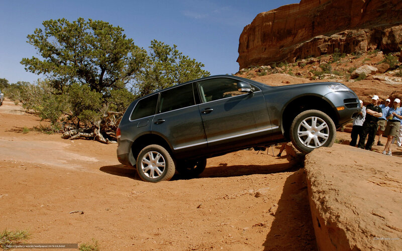 SUV navigating rocky terrain