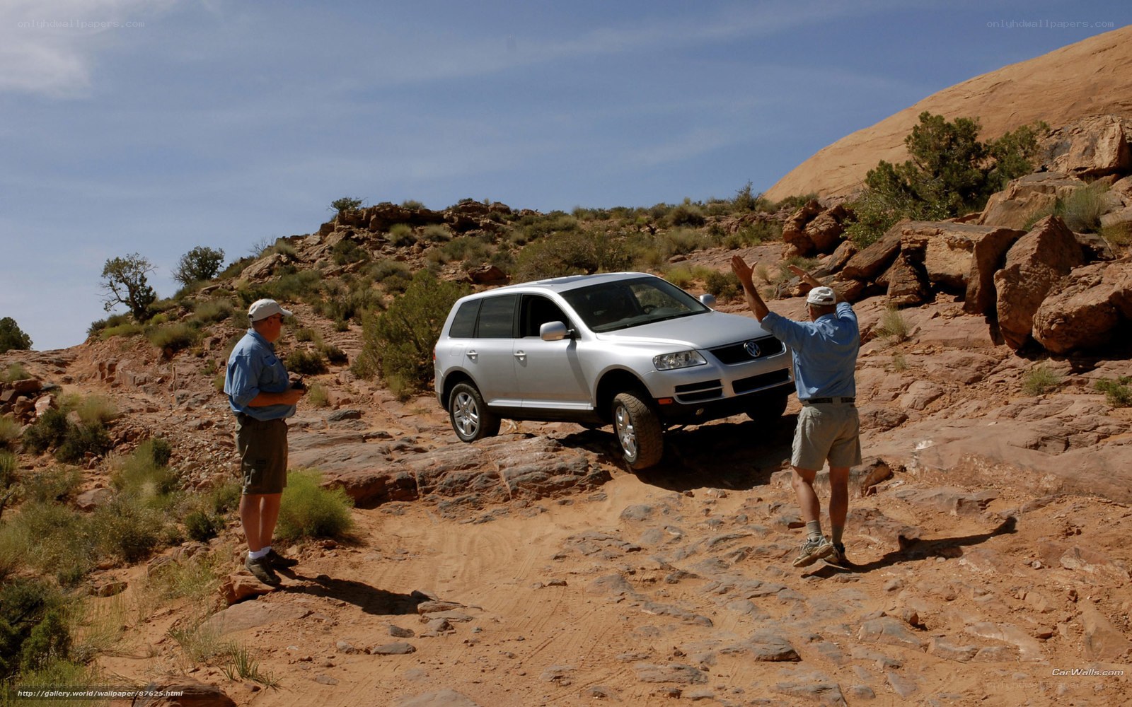 SUV off-roading in desert