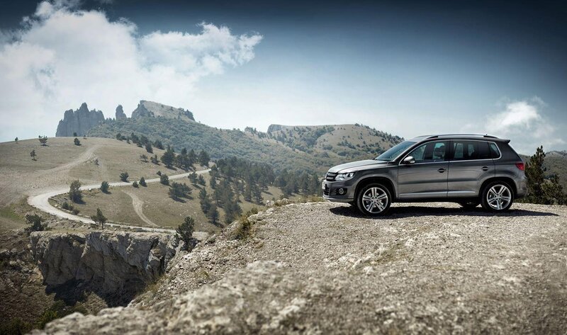 SUV on a mountain cliff