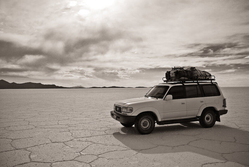 SUV on a salt flat