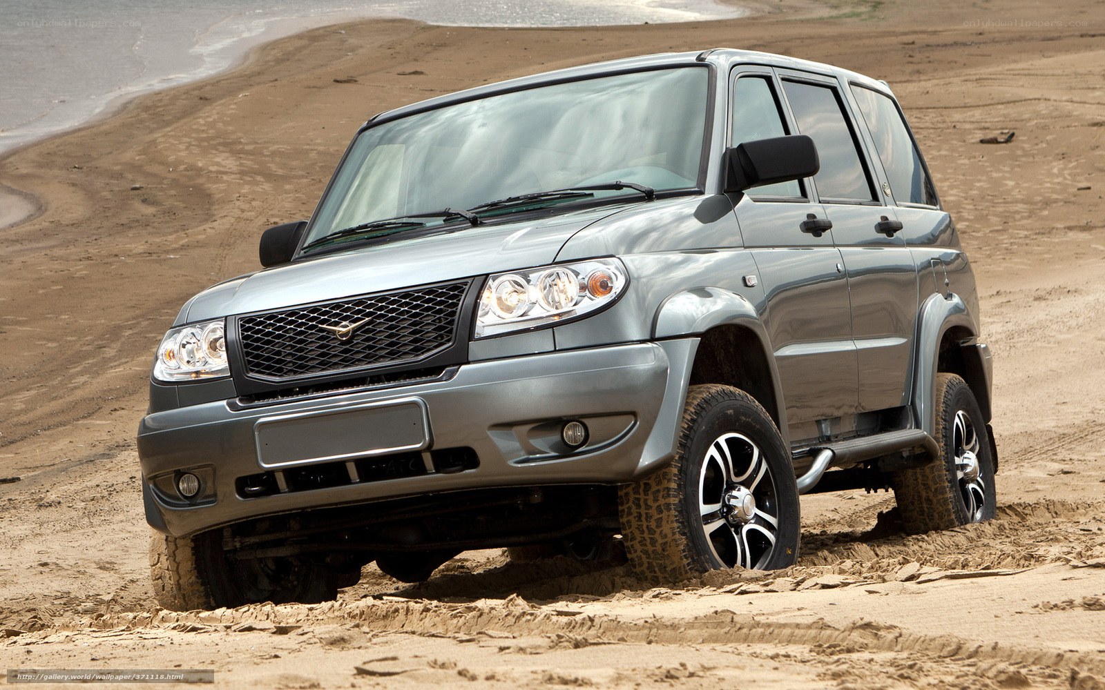 SUV on a sandy beach