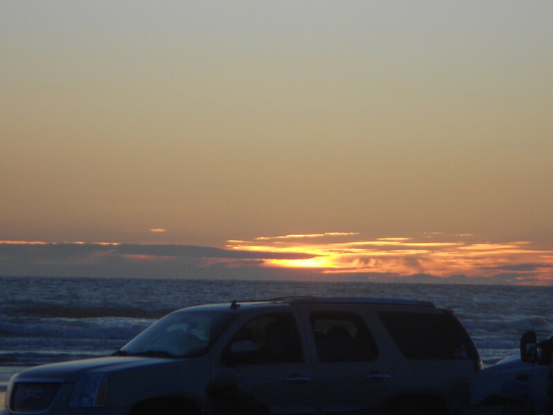 SUV on Beach at Sunset — Orange