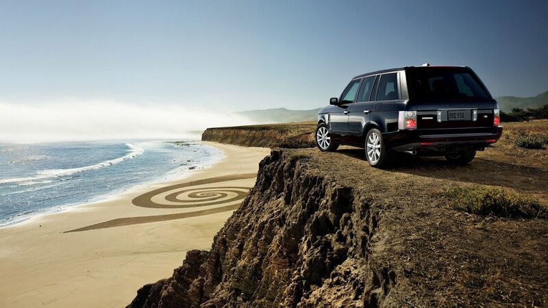 SUV on coastal cliff
