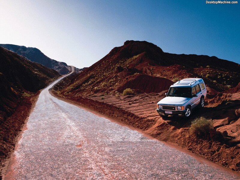 SUV on desert road