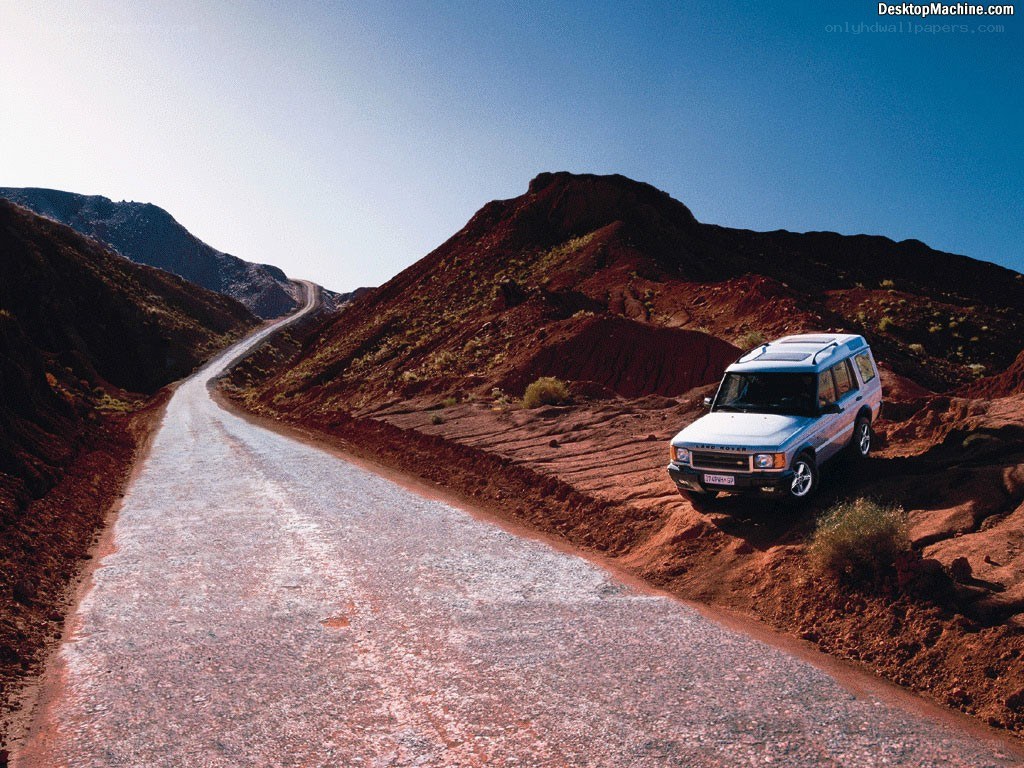 SUV on desert road