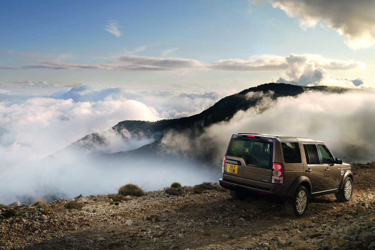 SUV on mountain overlook