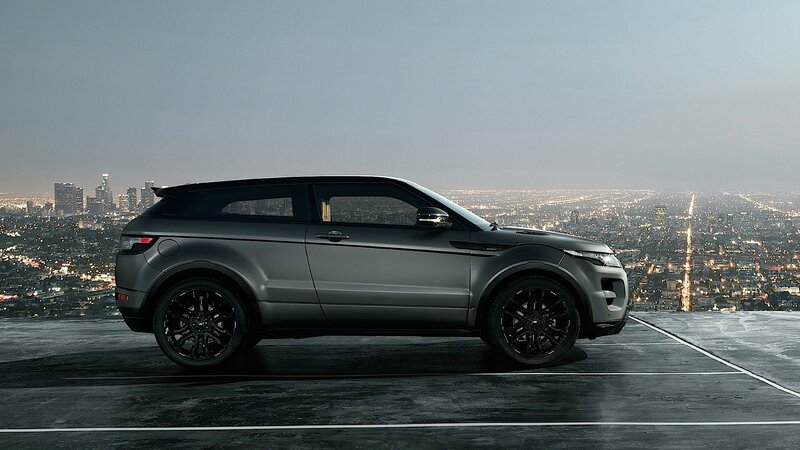 SUV on rooftop overlooking city