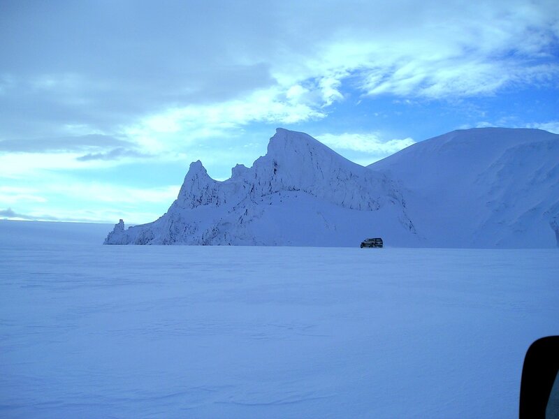 SUV on snowy plain