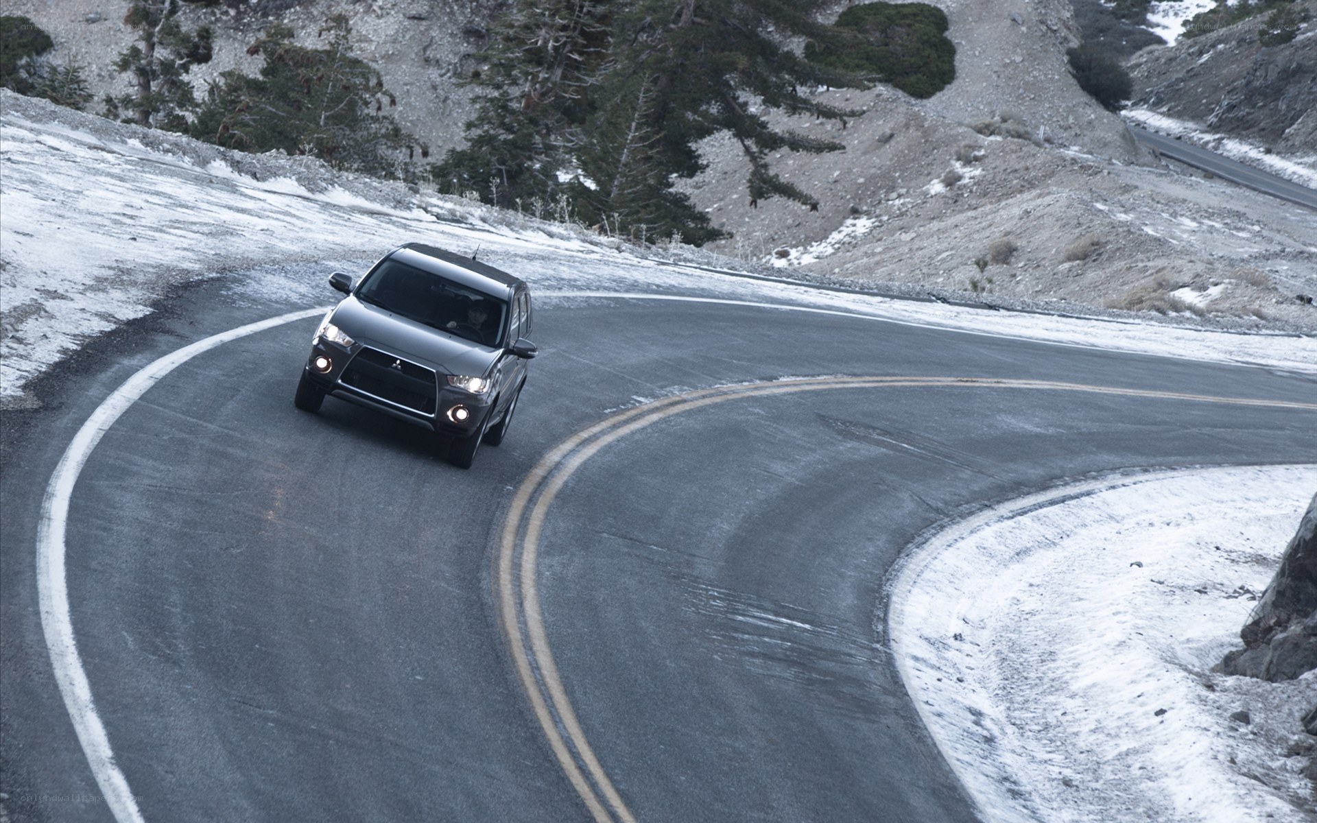 SUV on winding mountain road
