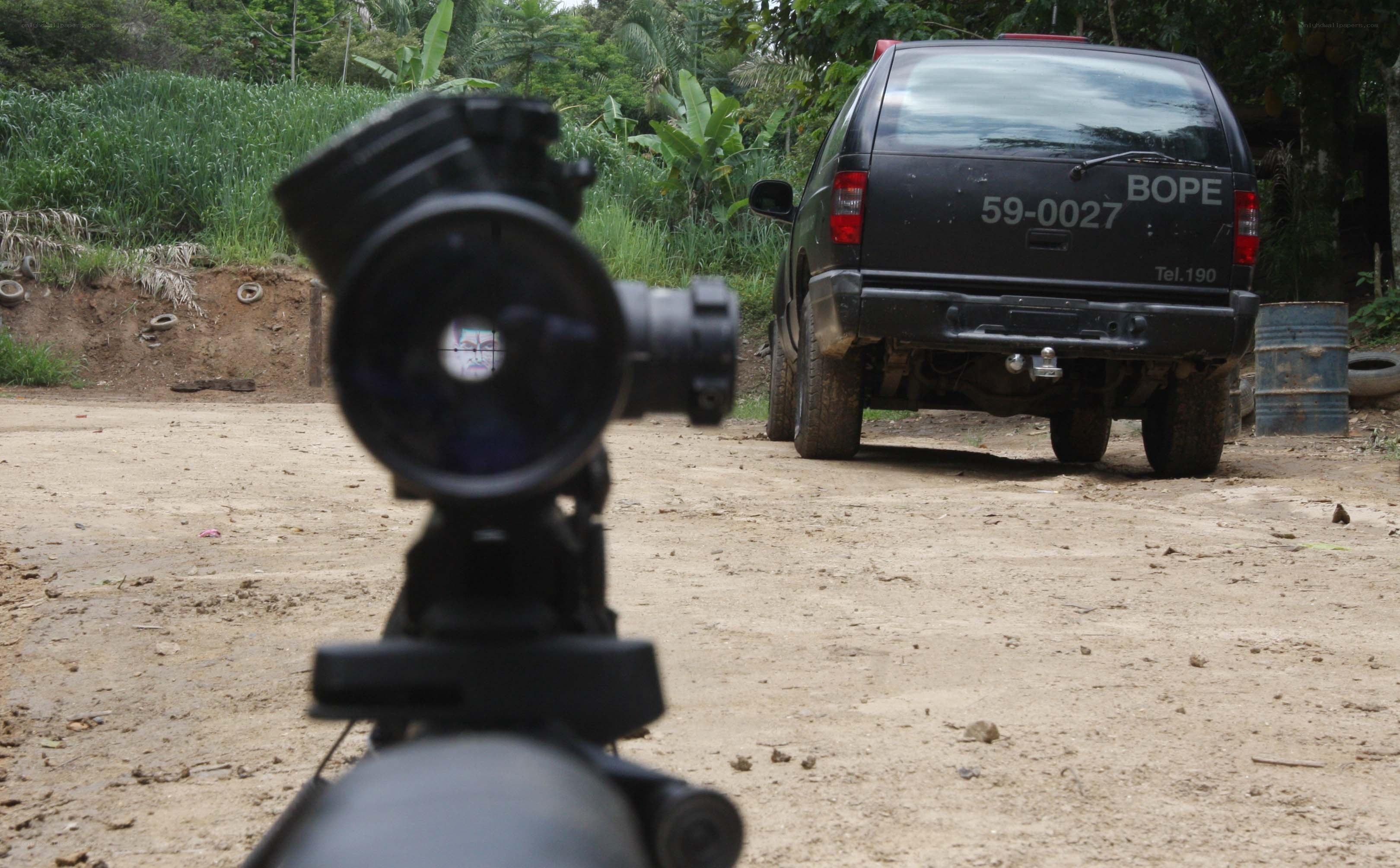 SUV targeted through rifle scope