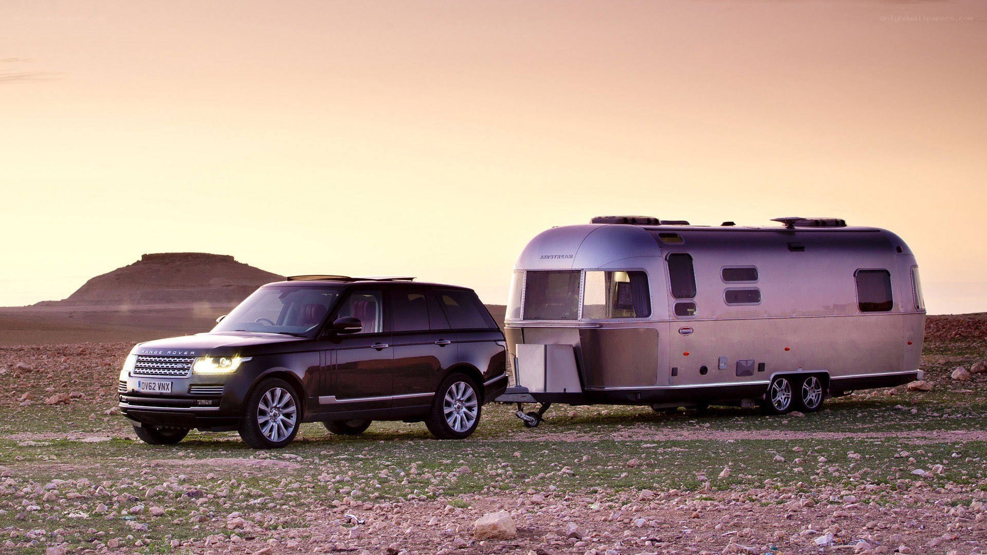 SUV towing a camper trailer