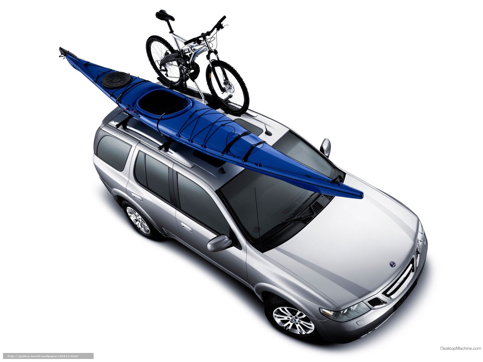 SUV with kayak and bike