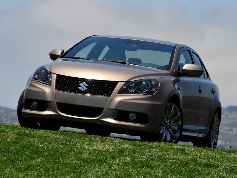 Suzuki Kizashi on a grassy hill