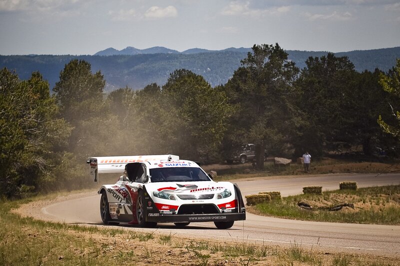 Suzuki rally car on dirt road