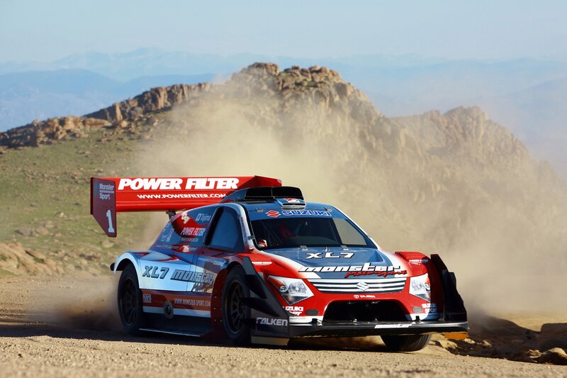 Suzuki rally car on dirt road