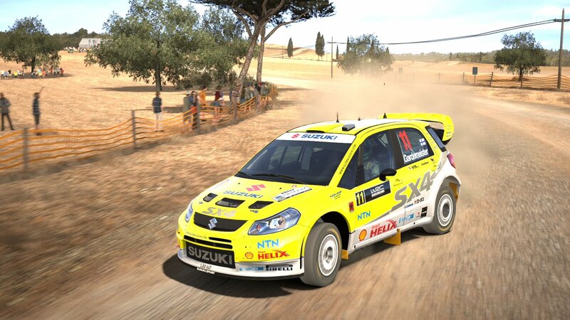 Suzuki rally car on dirt road