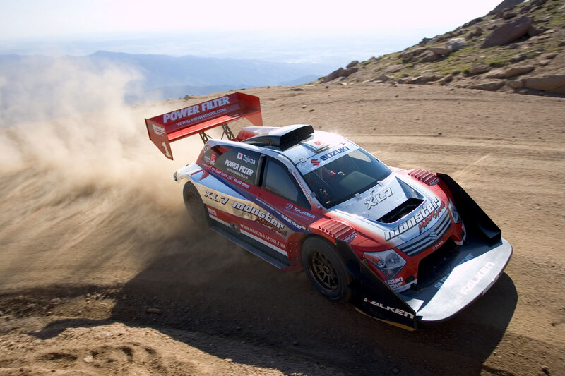 Suzuki rally car on dirt track