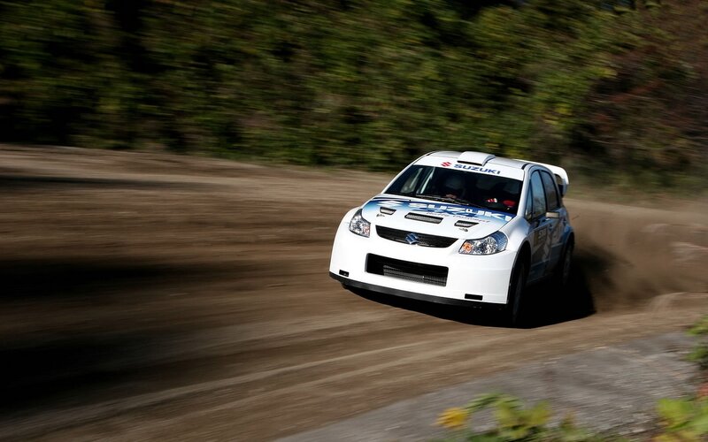 Suzuki rally car on dirt track
