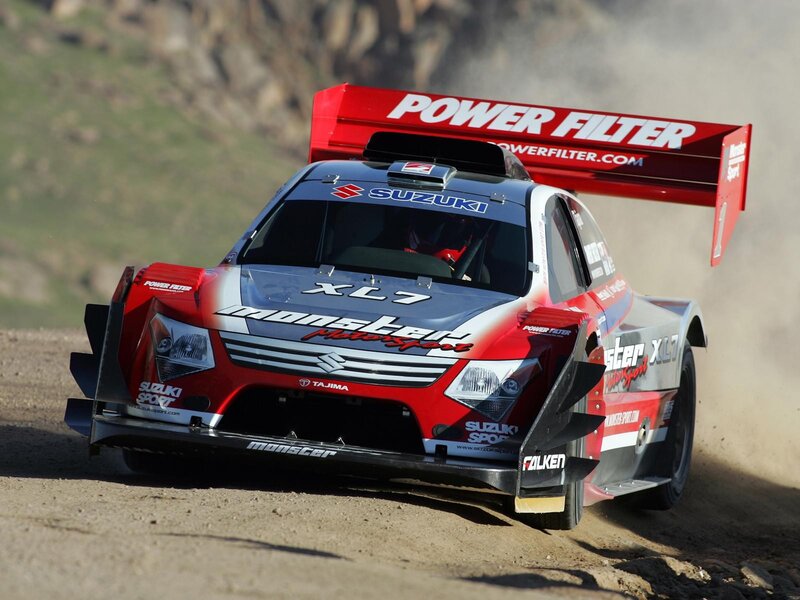 Suzuki rally car on dirt track