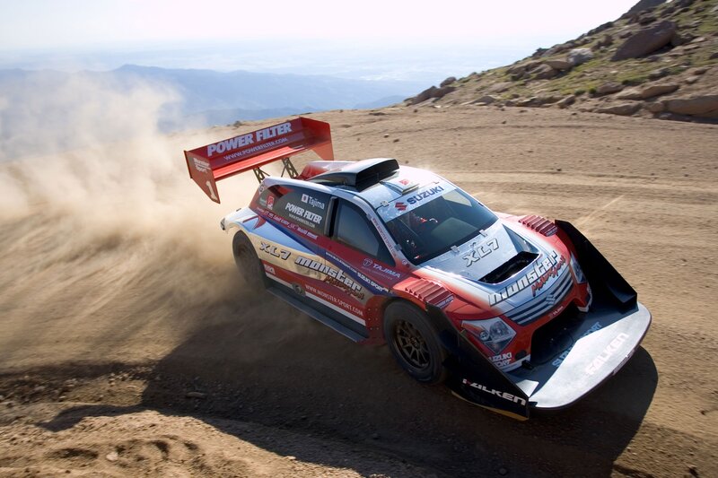 Suzuki rally car on dirt track