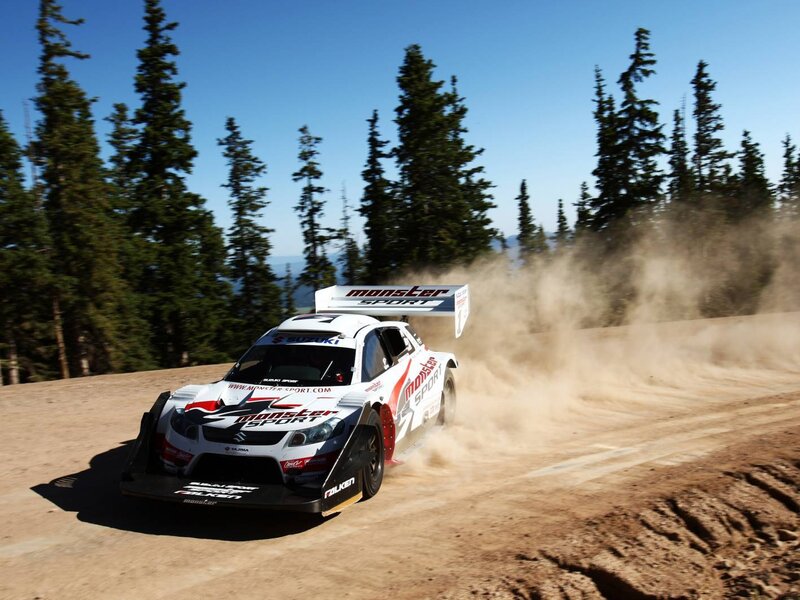 Suzuki rally car on dirt track