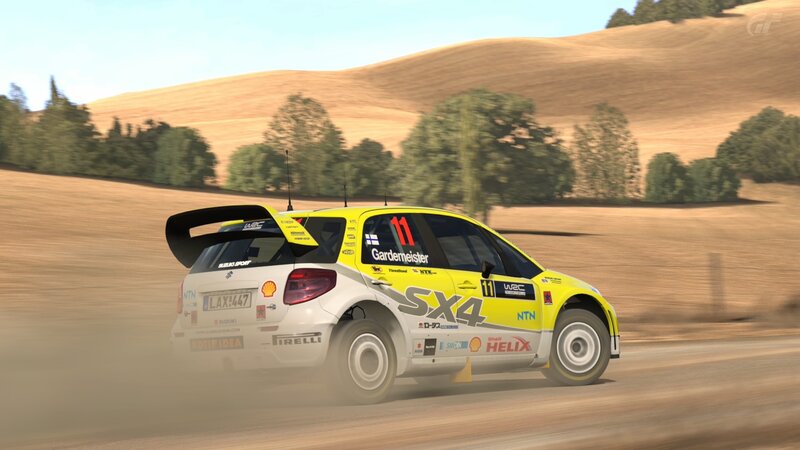 Suzuki SX4 rally car on dirt road