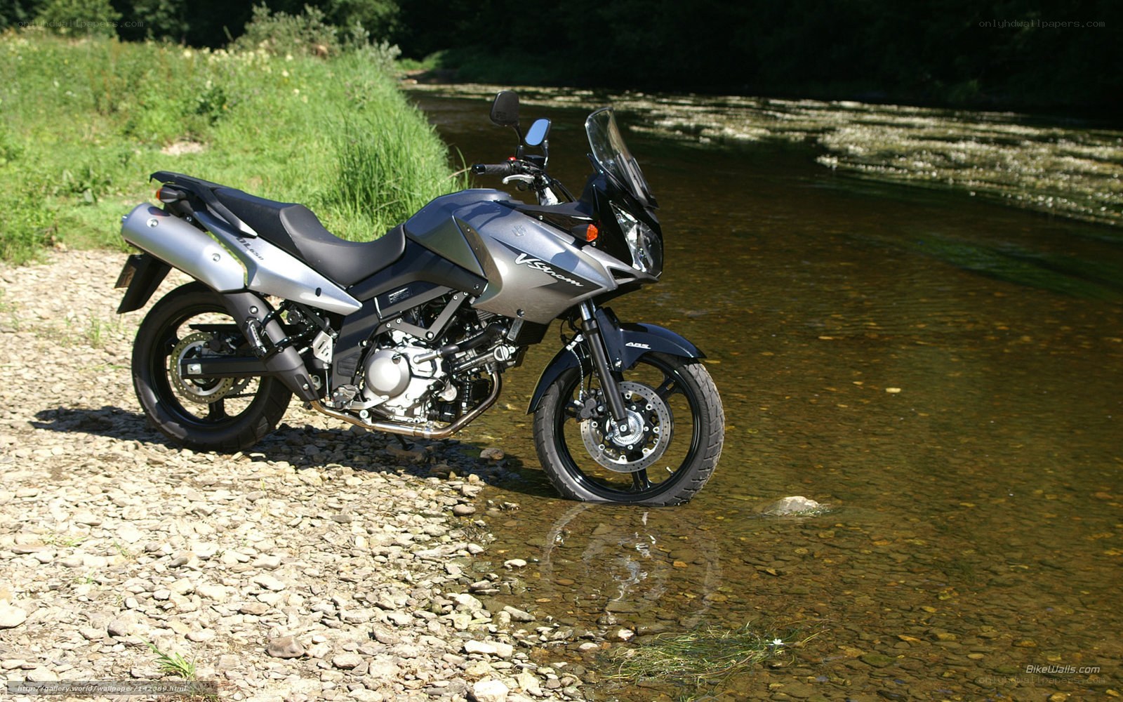 Suzuki V-Strom motorcycle by river