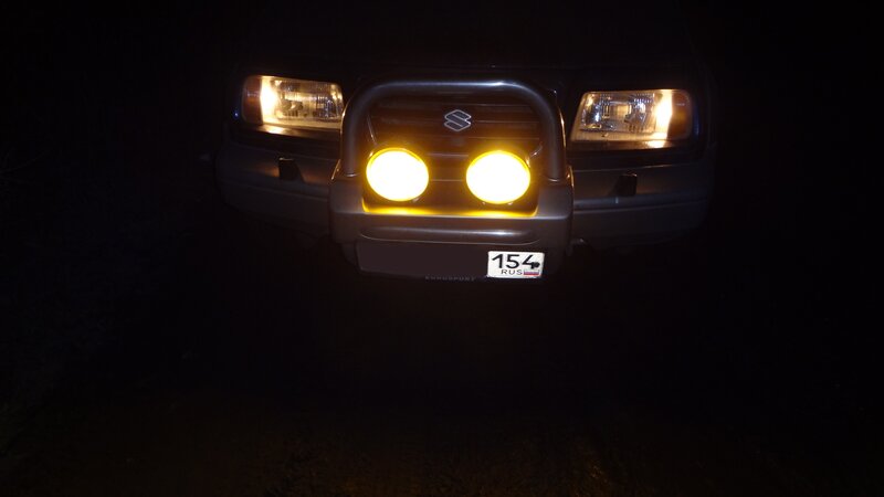 Suzuki vehicle at night