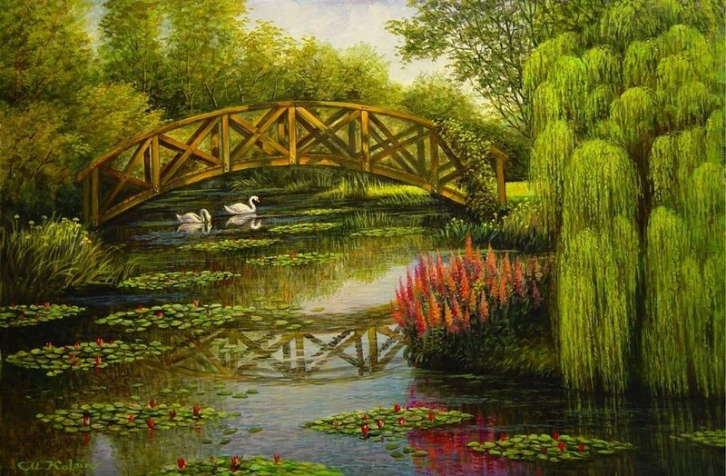 Swans on a pond with bridge