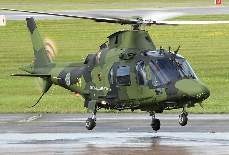Swedish military helicopter on runway