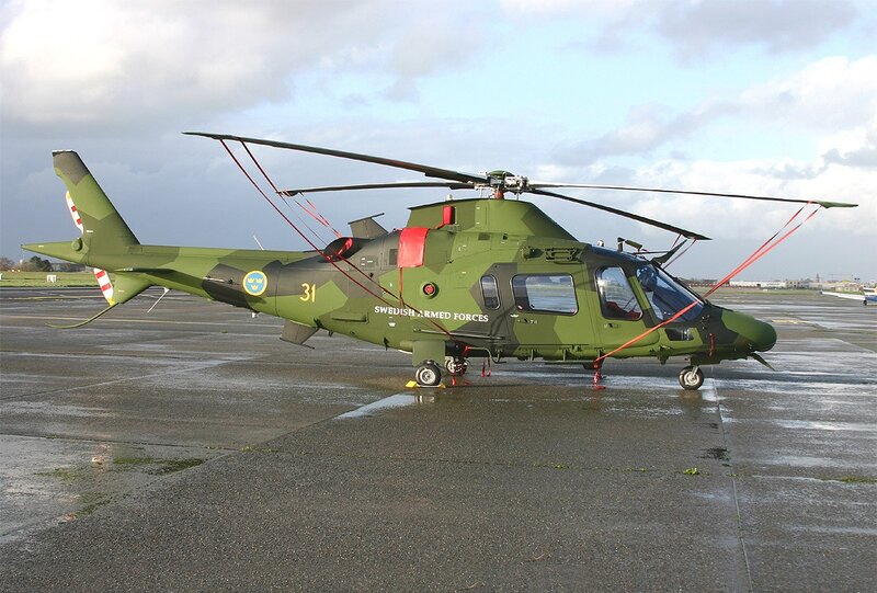 Swedish military helicopter on tarmac