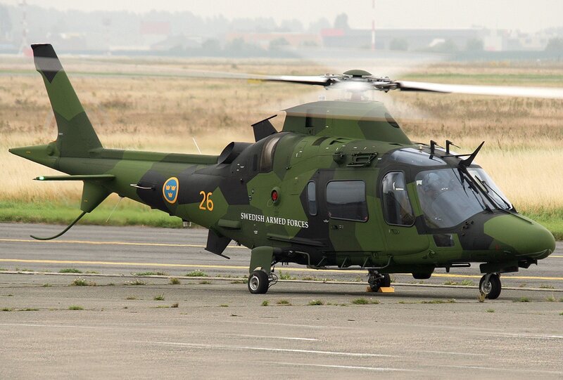 Swedish military helicopter on tarmac