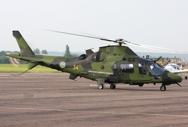 Swedish military helicopter on tarmac