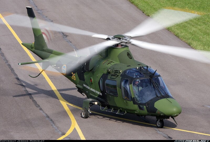 Swedish military helicopter on tarmac
