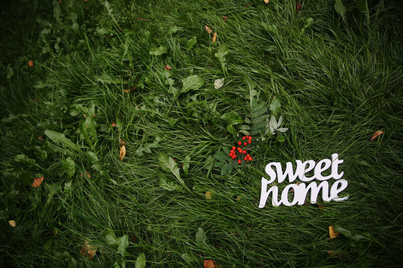 Sweet Home Sign on Grass