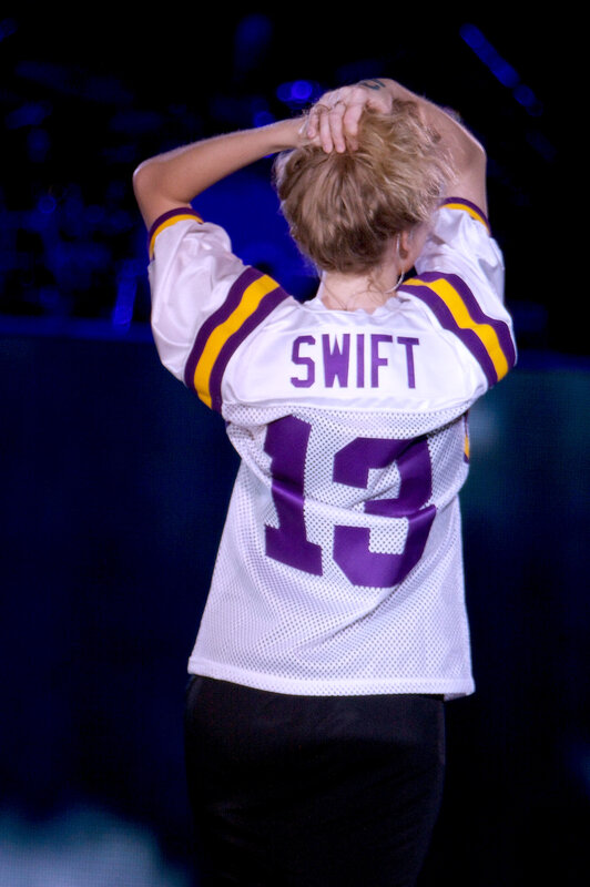 Swift in football jersey