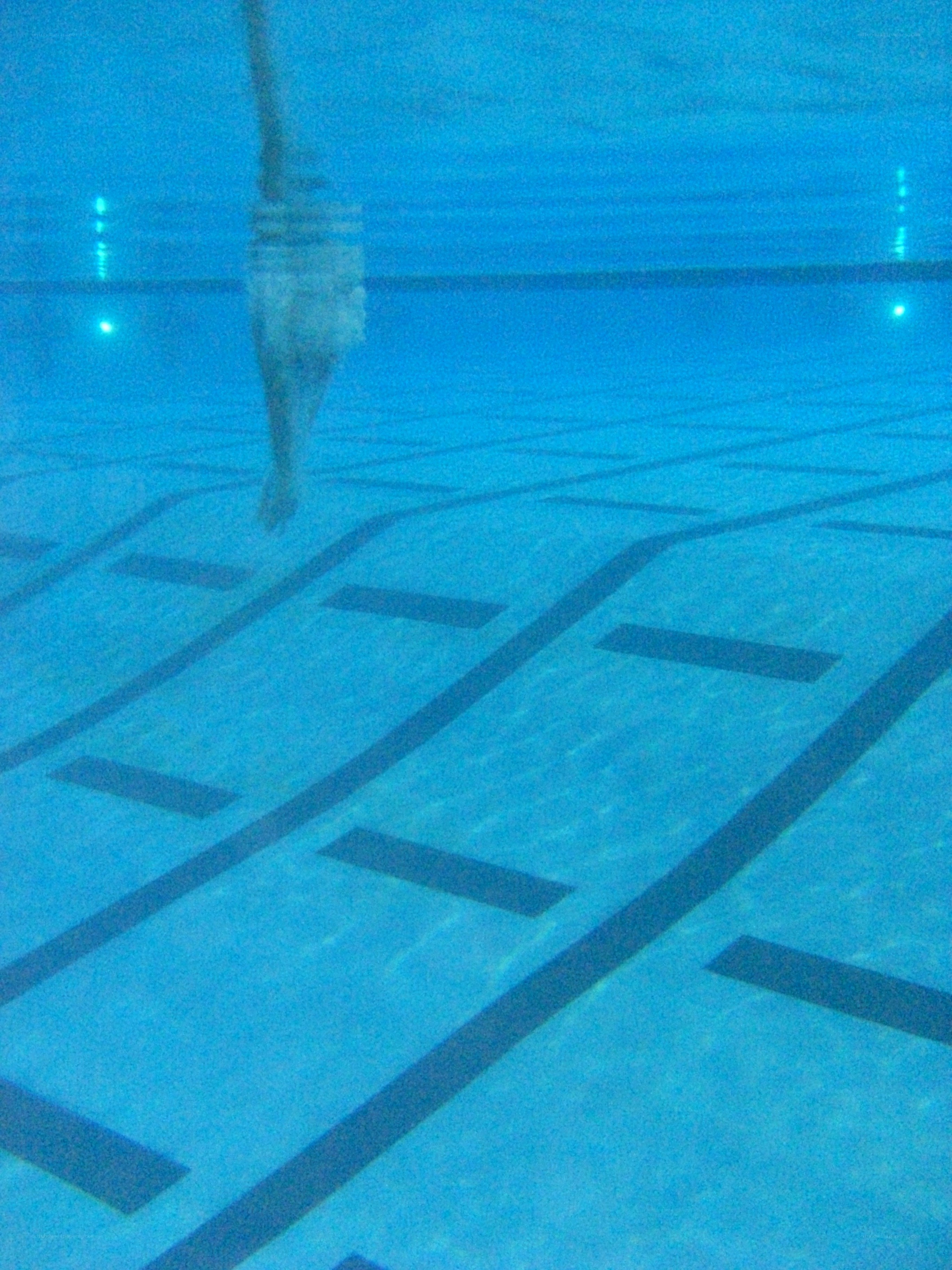 swimmer underwater in pool
