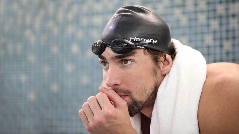 swimmer with cap and goggles