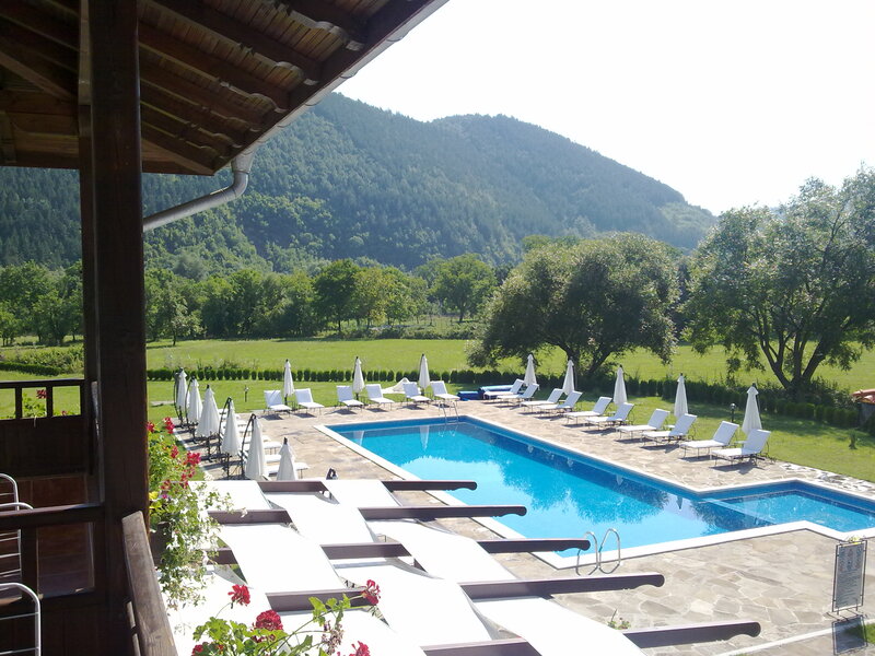 Swimming Pool with Lounge Chairs
