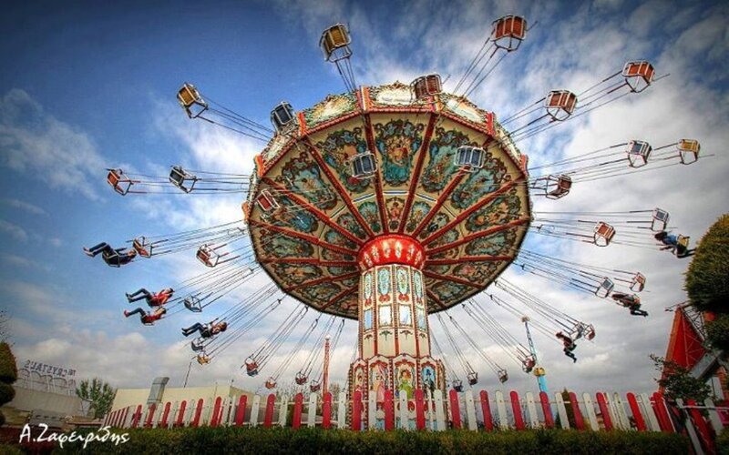 Swing Ride at Amusement Park — Blue, Active