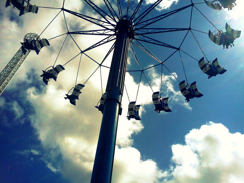 Swing Ride at Amusement Park — Blue