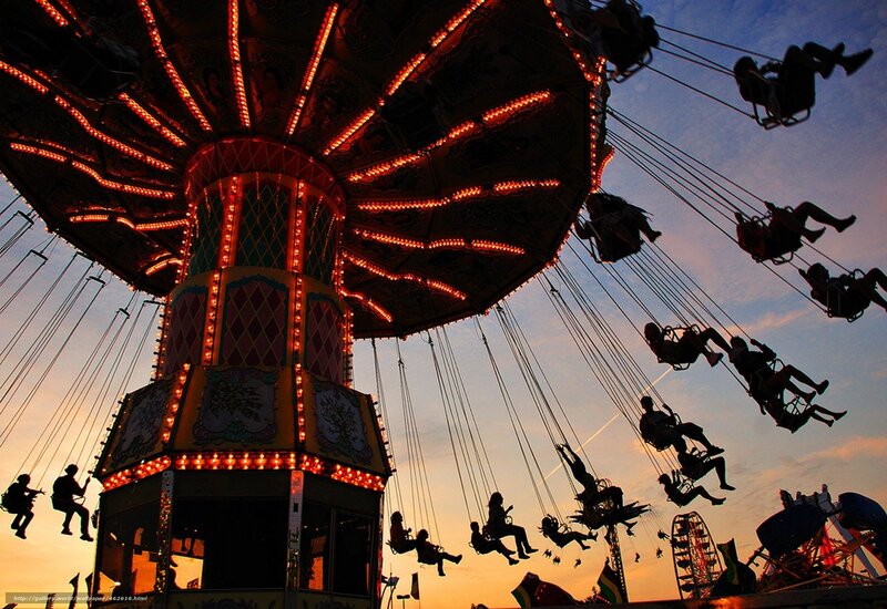 Swing Ride at Amusement Park — Orange