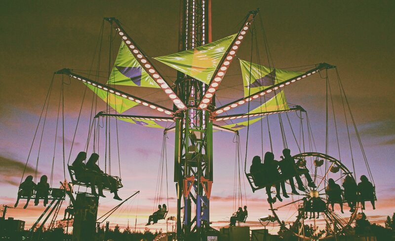 Swing Ride at Amusement Park — Purple