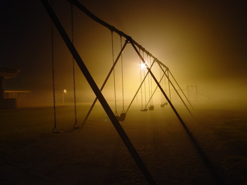Swings in the foggy night