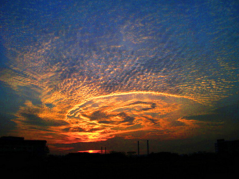 Swirling Clouds at Sunset